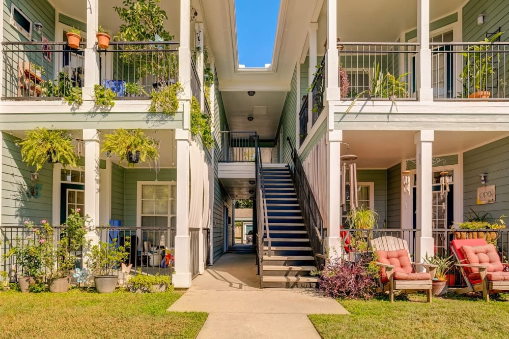 Exterior view of apartment entrances at Audubon Lake Apartments