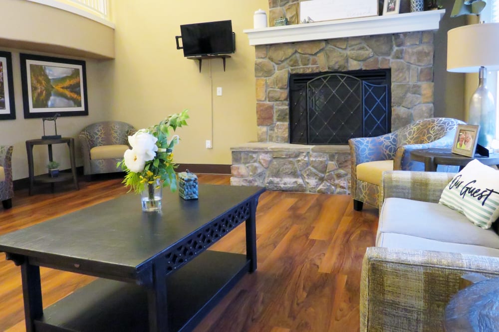 Fireplace with seating area at Meadowlark Senior Living in Lebanon, Oregon