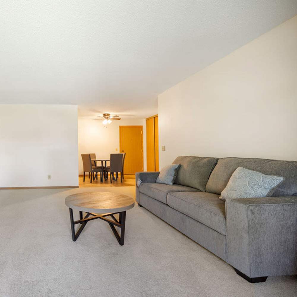 Living room connected to dining at Solace on Lake Minnetonka in Spring Park, Minnesota