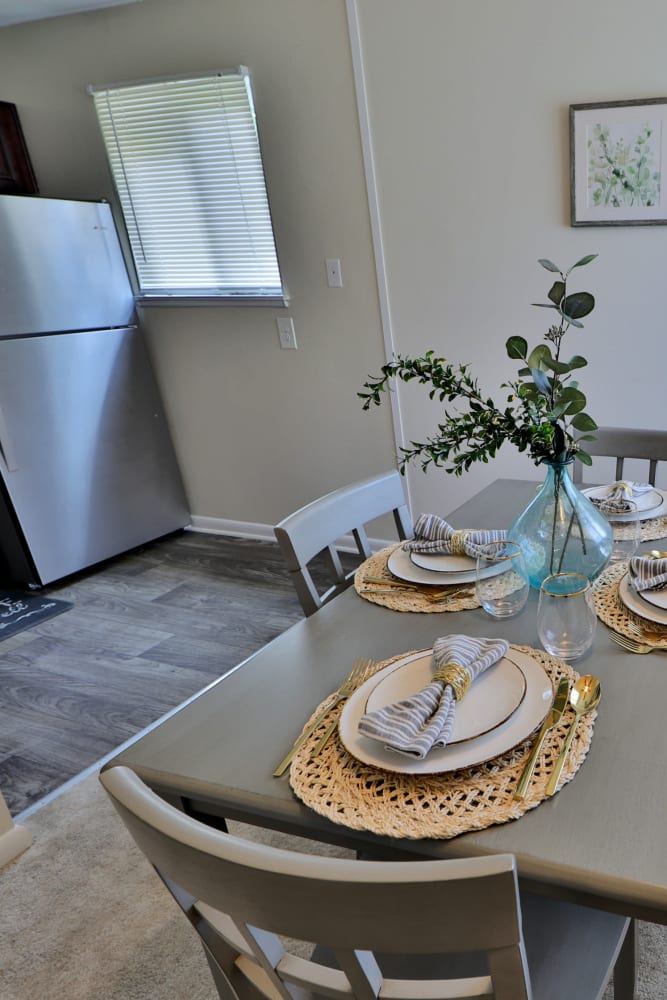 Dining area in a model home at Charlesmont Apartment Homes in Dundalk, Maryland