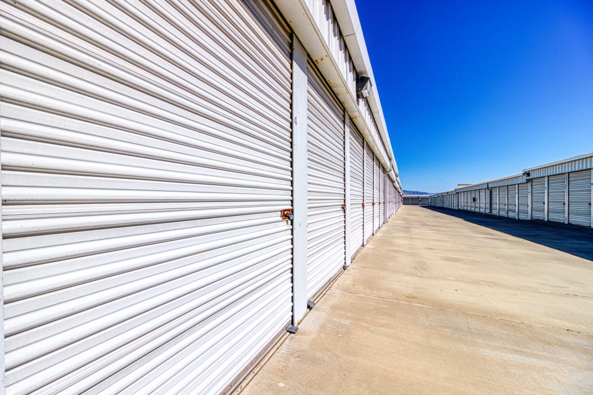 Open driveways and large parking spaces at Devon Self Storage in Palm Springs, California