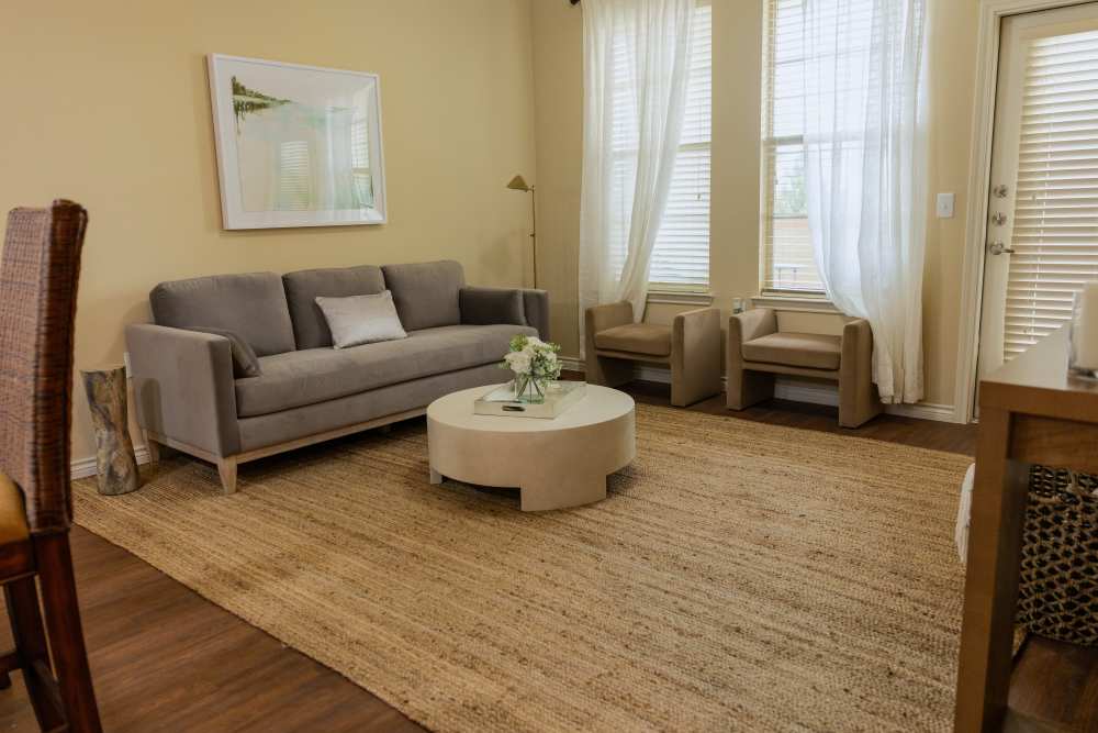 Living room with coffee table at Renaissance At North Park in Lubbock, Texas