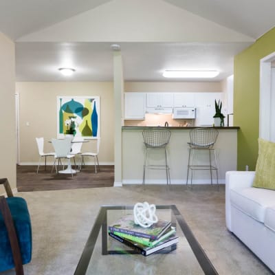 Modern living room in a open concept model home at Haven at Golf Creek in Portland, Oregon