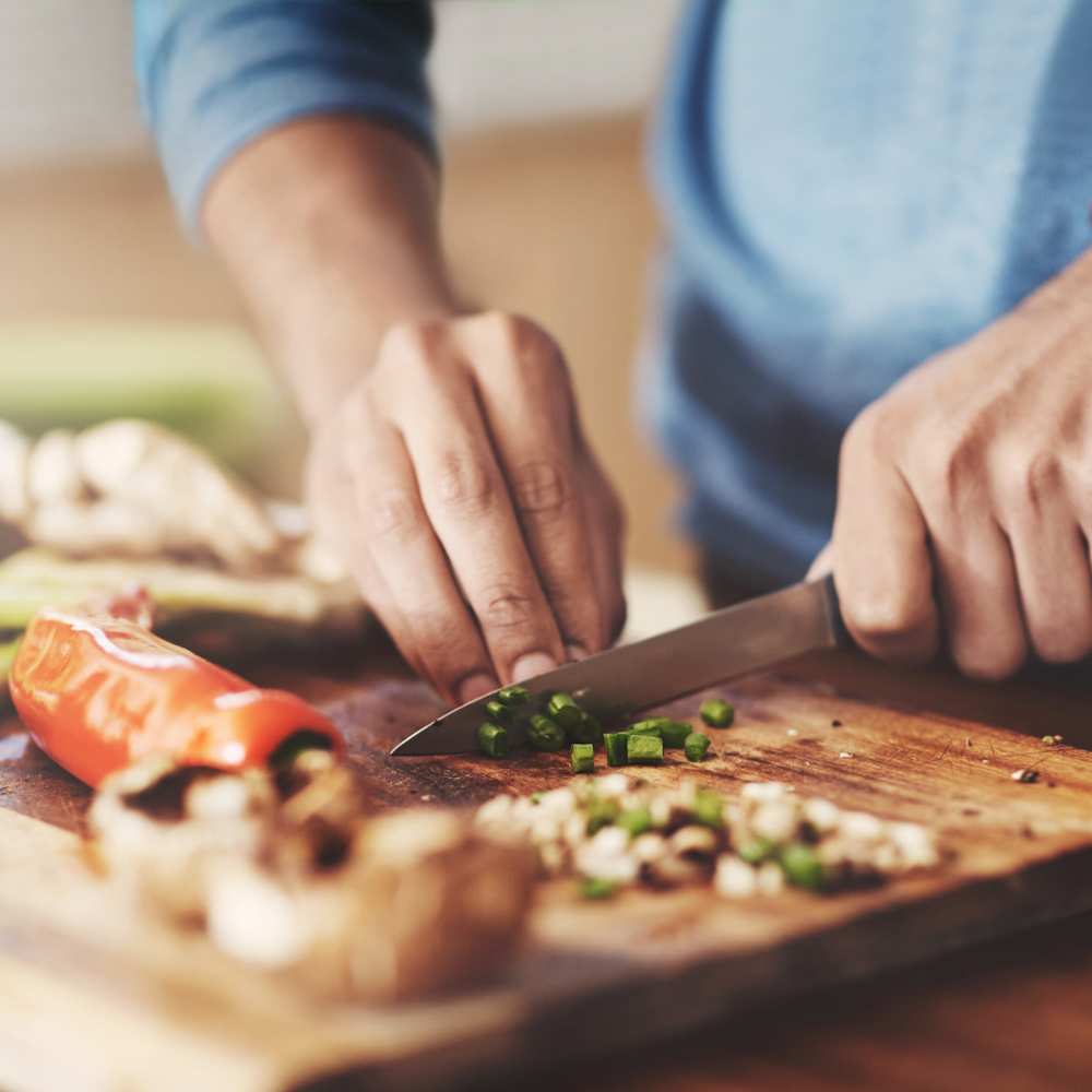 Resident prepping food at Boulder Crescent in Colorado Springs,Colorado