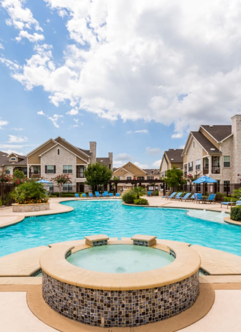 Hot tub and pool area at Marquis at Cinco Ranch in Katy, Texas