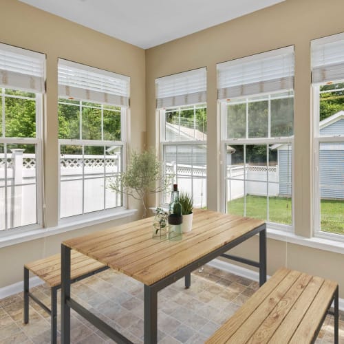 A furnished dining room at Columbia Colony in Patuxent River, Maryland