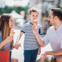 A happy family having an ice cream near The Greyson in Hilliard, Ohio
