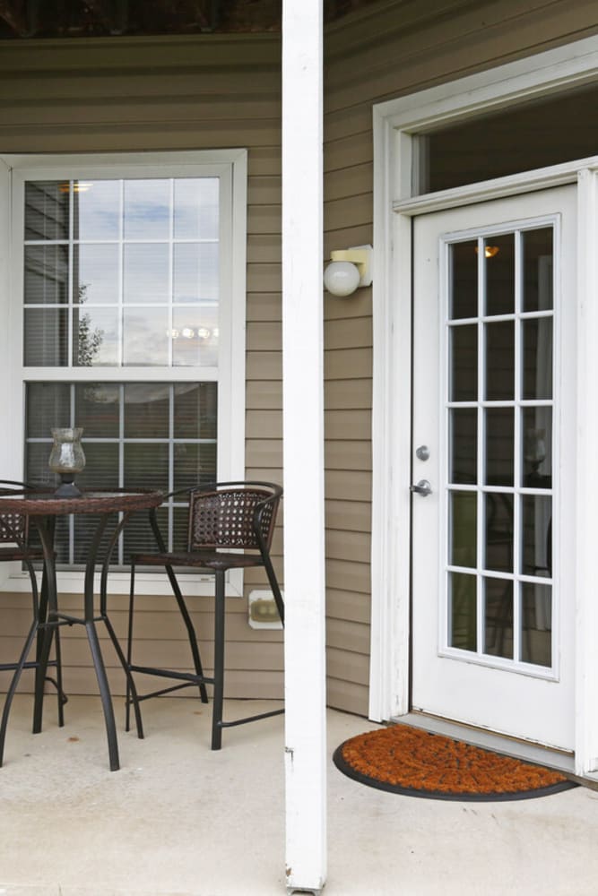 Resident private patio with furnishings at Watersedge in Champaign, Illinois