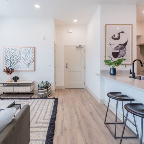 Living room and counter seating at Towne Centre Apartments in Lathrop, California