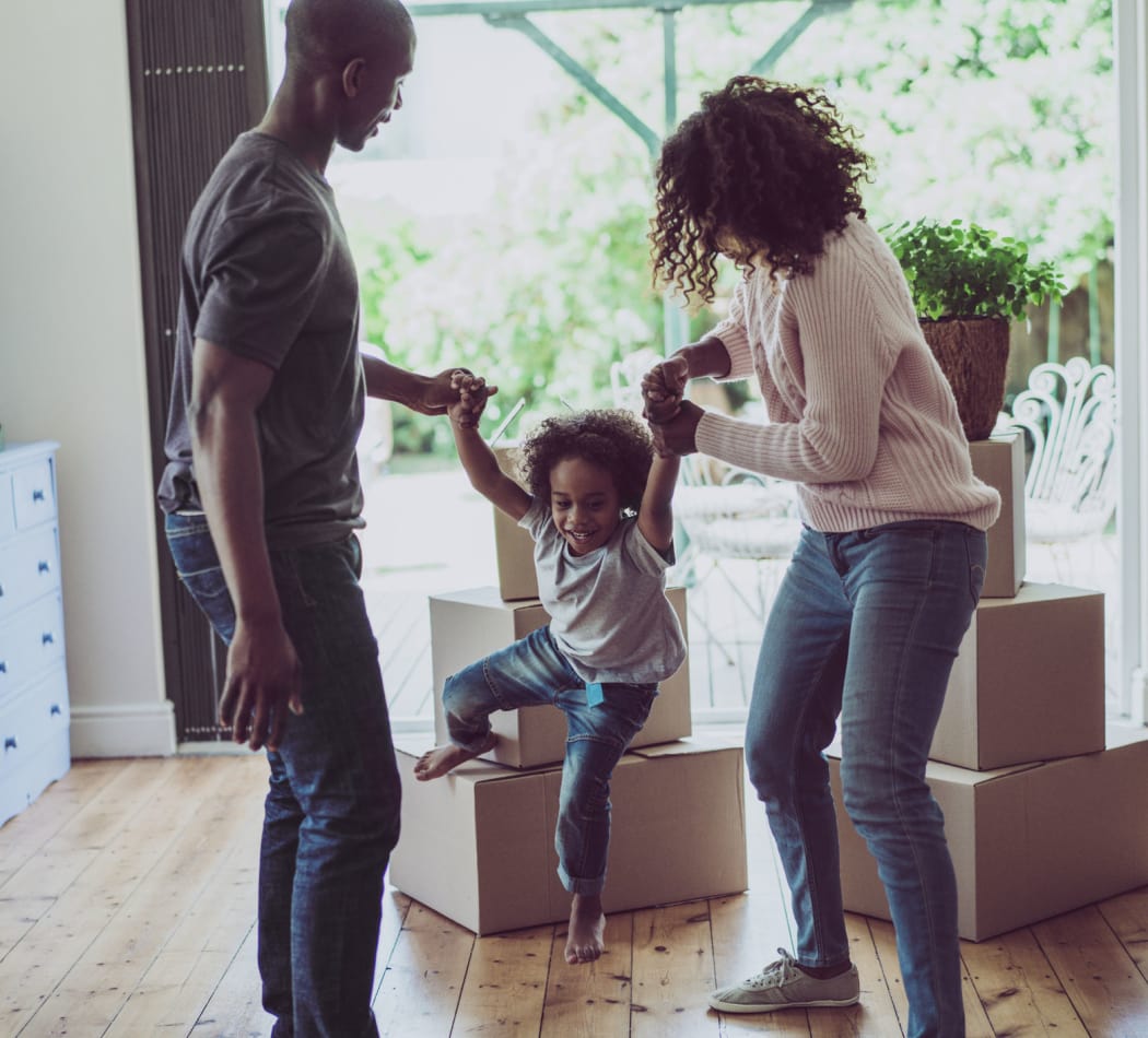 Family moving into Frederick Douglass Apartments