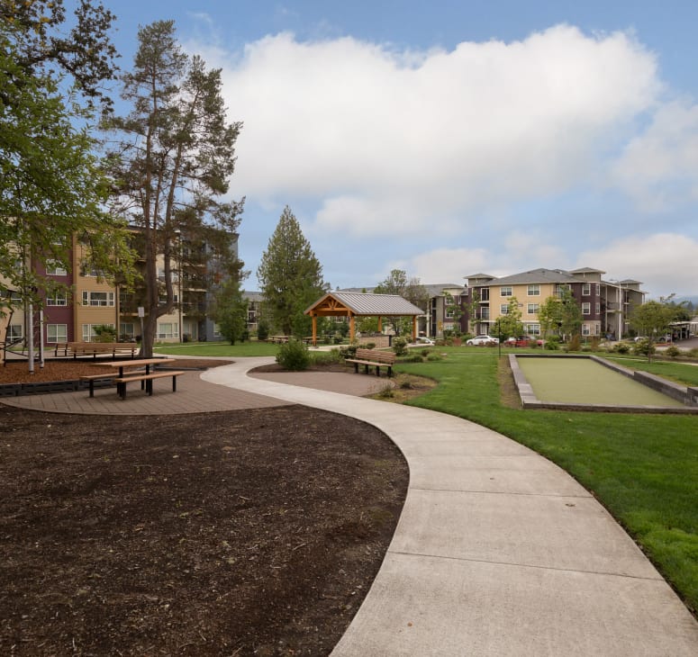 Exterior photo of homes and a walking path at Terrene at the Grove in Wilsonville, Oregon