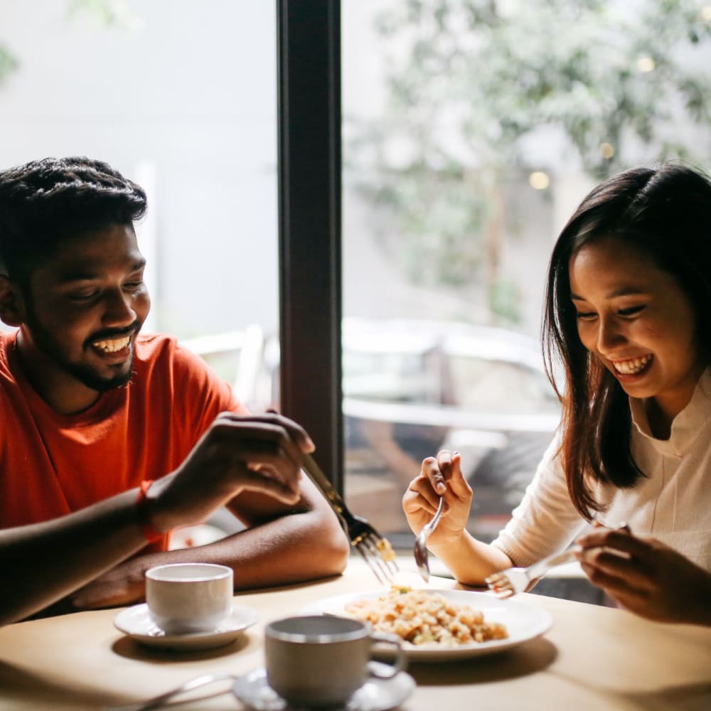 Couple enjoying their breakfast in their dinning area at Pacific Palms in Stockton, California 