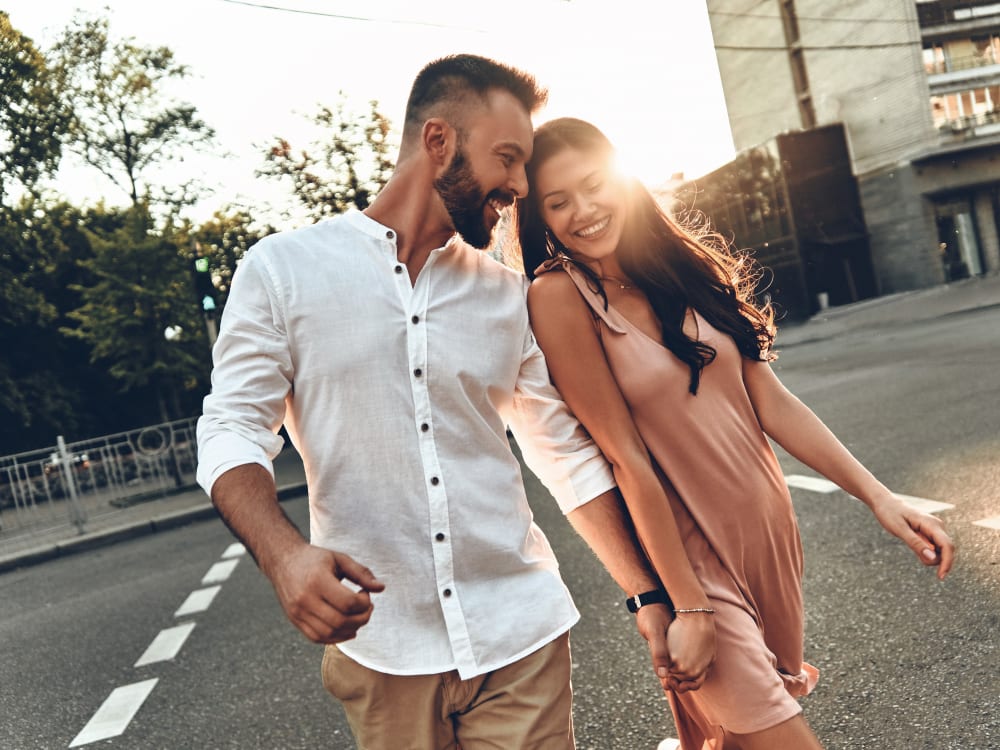 Couple walking downtown near Club Cancun in Chandler, Arizona