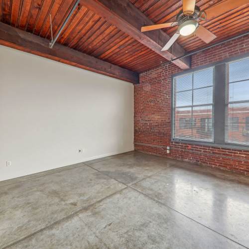 Unfurnished bedroom with height ceiling at Stadium Loft Apartments in Saint Louis, Missouri
