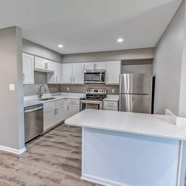 Kitchen with cabinets and appliances at Cypress Pointe in Crown Point, Indiana