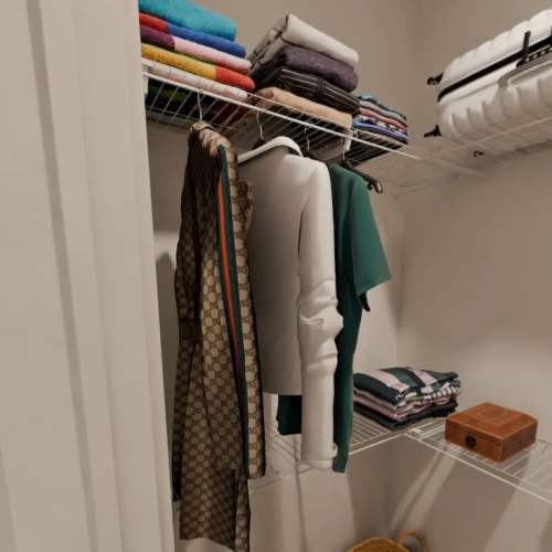 Organized closet with folded clothes and hanging garments at Russ Town Crossing in Ruston, Louisiana