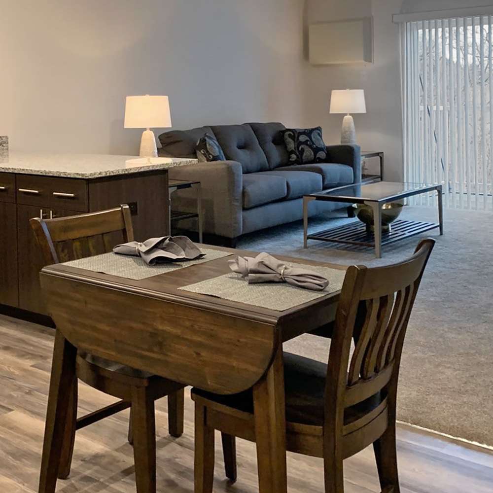 Dining area with view to living room at Depot on Main in Zimmerman, Minnesota