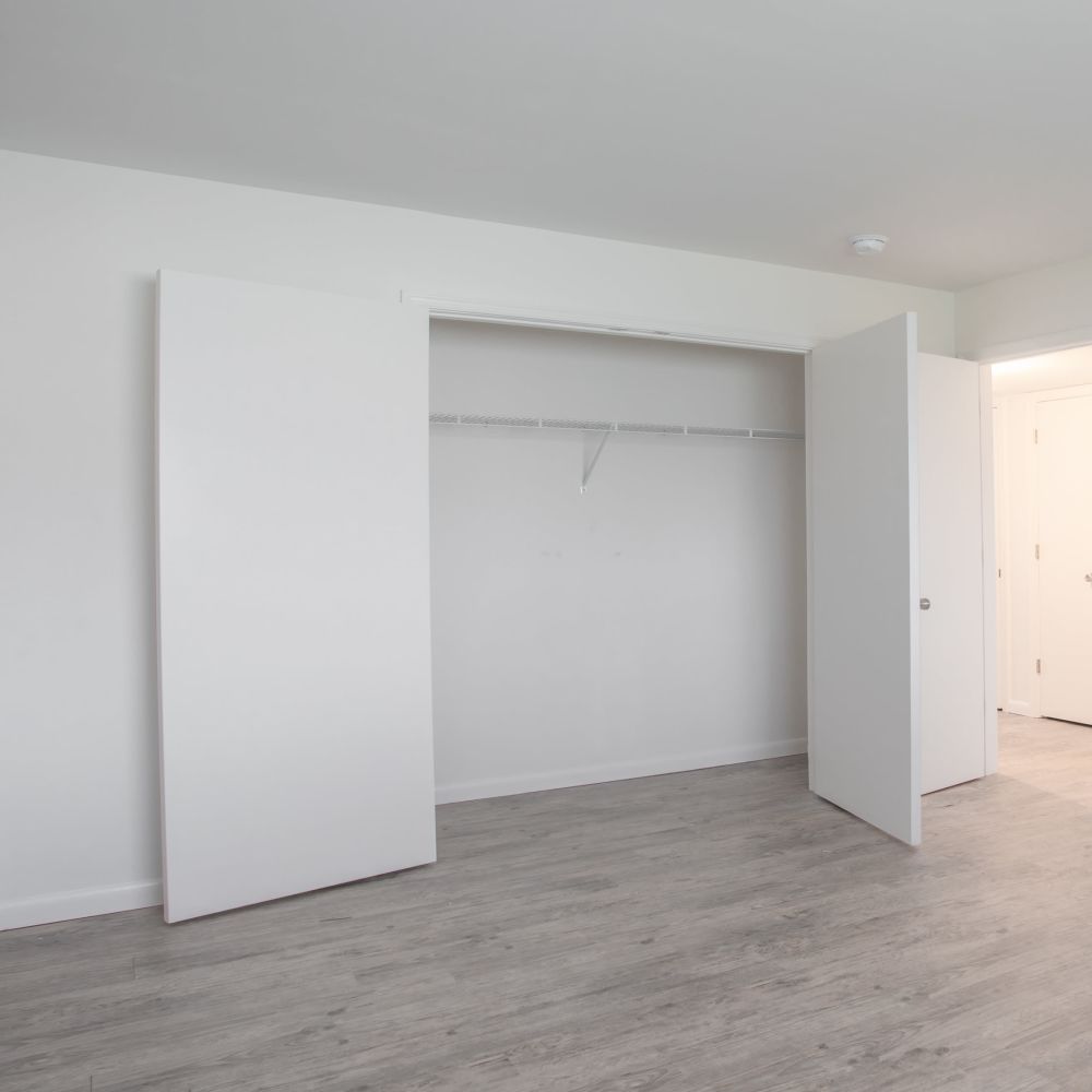 Open closets of a bedroom at Pebblestone Gardens in Newport News, Virginia