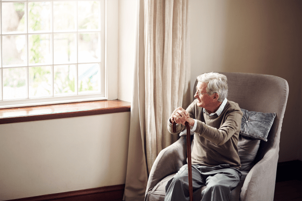 Senior man smiling in his apartment at The Birches at Newtown in Newtown, Pennsylvania