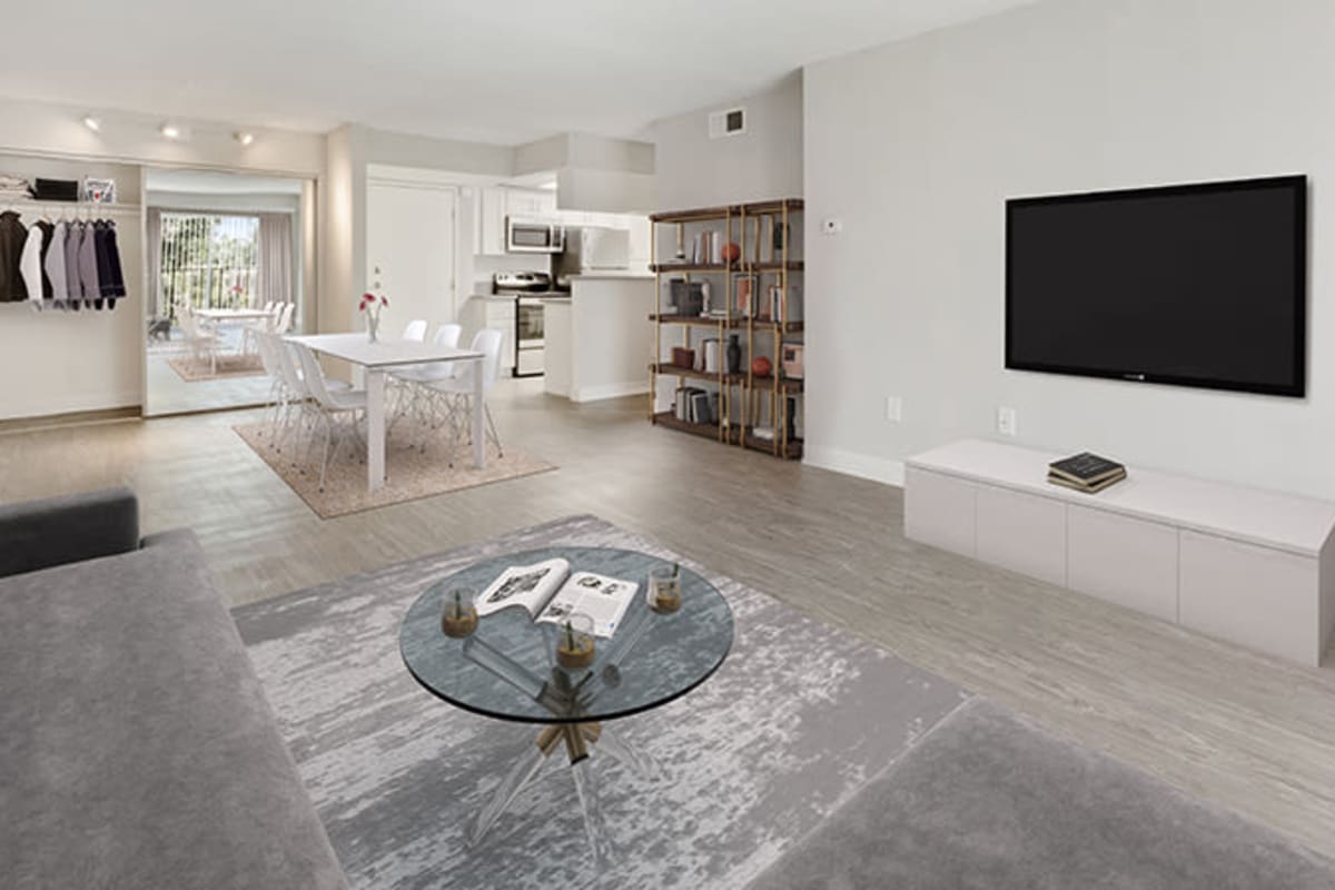 Spacious apartment with wood-style flooring at Amanda Regency Apartments, Van Nuys, California