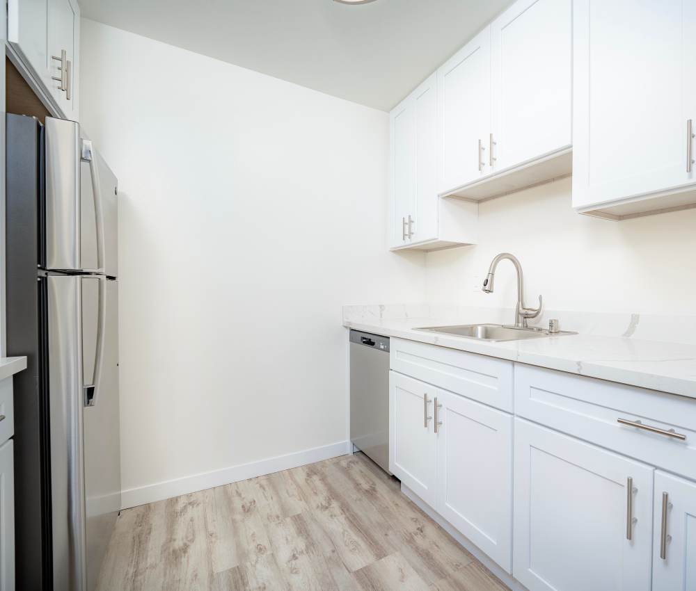 Kitchen with stainless-steel appliances at The Chateau Apartments in Mountain View, California