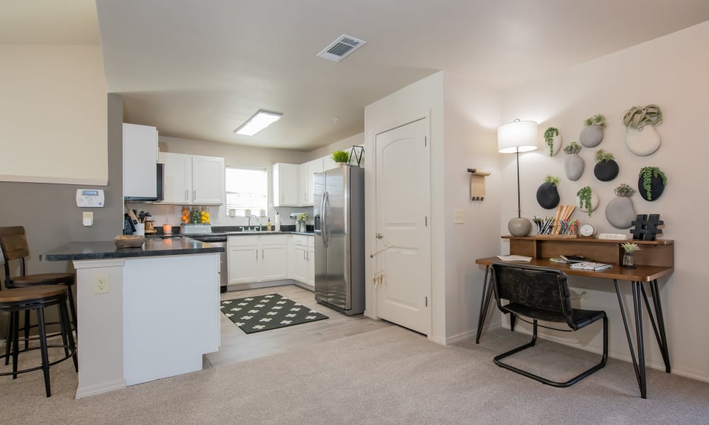 Living room at Portico at Friars Creek Apartments in Temple, Texas