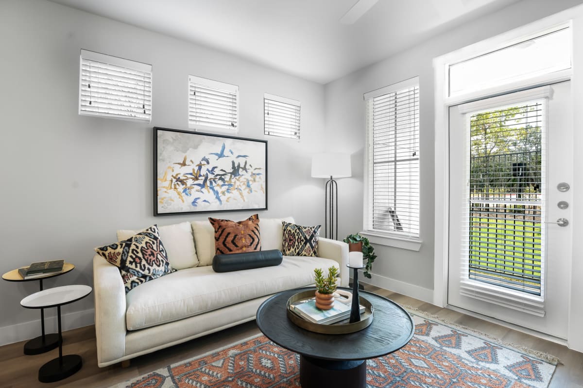 Well-decorated model living space at The Gabriel in Leander, Texas