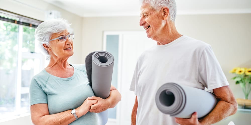 Residents with yoga mats at The Springs at Lancaster Village in Salem, Oregon
