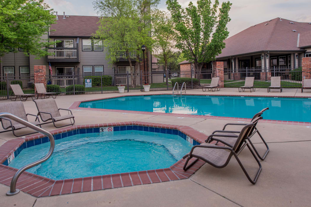 Swimming pool and hot tub at Huntington Park Apartments in Wichita, Kansas