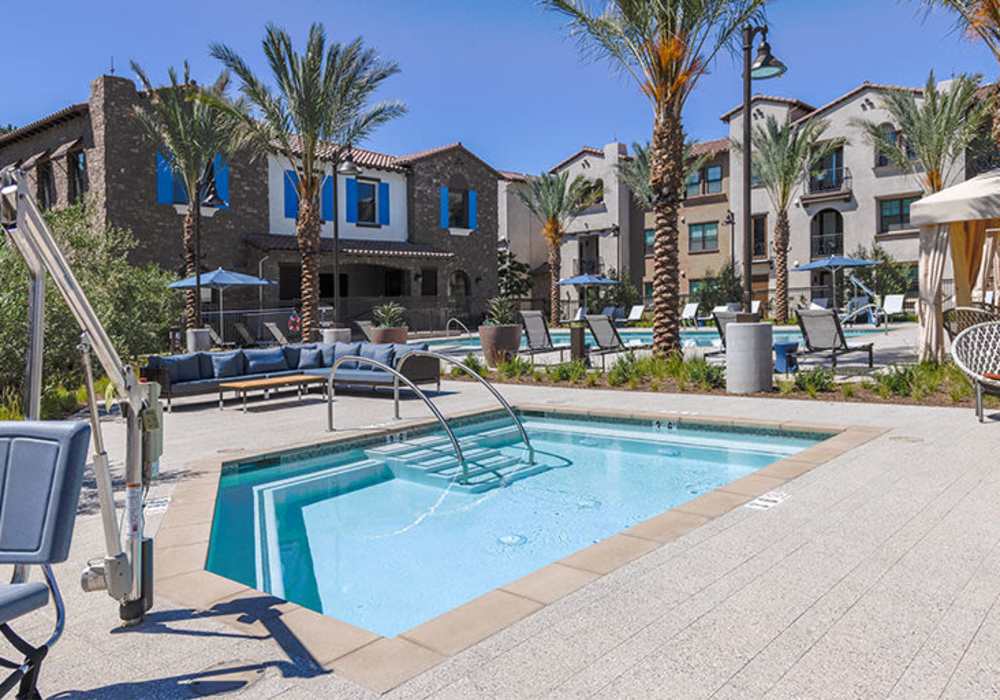 Hot tub with palm tree at The Courtyards Pacific Village in San Diego, California