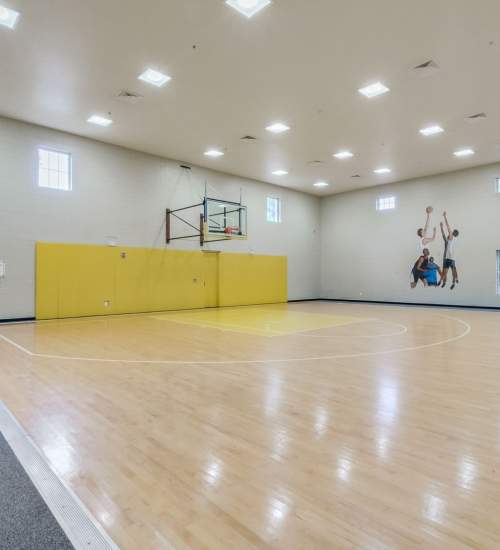 On-site indoor basketball court at Victoria Park Apartments in Davenport,Florida
