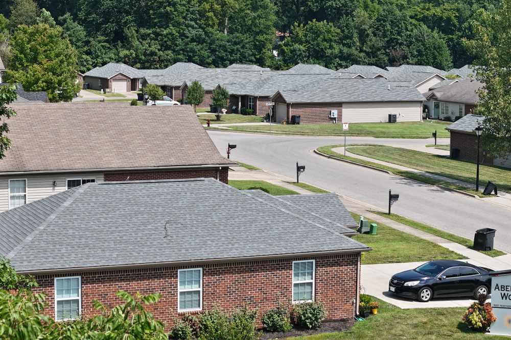 Residential neighborhood with tidy homes and green landscaping at Aberdeen Woods in Jeffersonville, Indiana