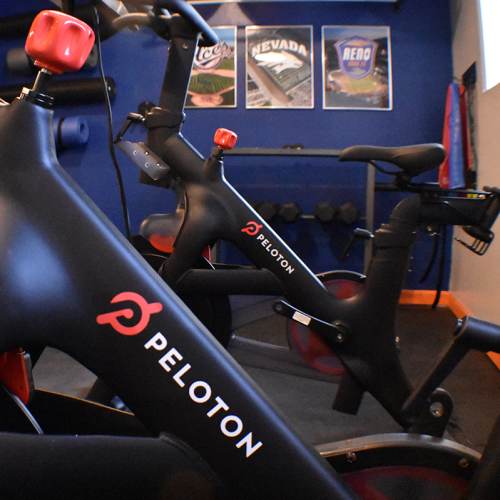 A group of residents having a toast in a bar near Bristle Pointe Apartments in Reno, Nevada