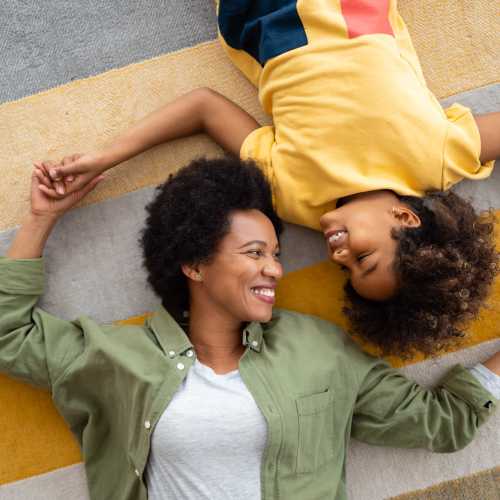 Happy resident with her kid at North River Landing in Elkhart, Indiana