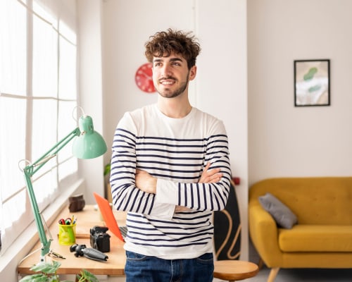 A resident in his apartment at University Lofts at Greensborough Village, Jonesboro, Arkansas