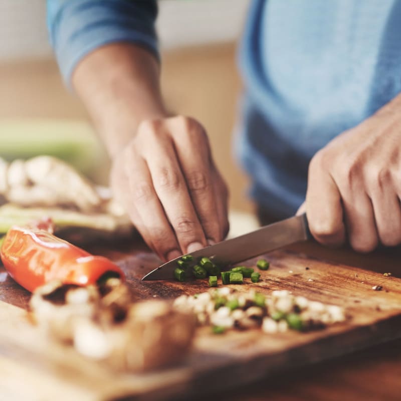 Resident prepping food at Portola Terrace in Temecula, California