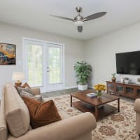 Modern furnishings in a model apartment's living area at Equinox at Midtown in Chattanooga, Tennessee