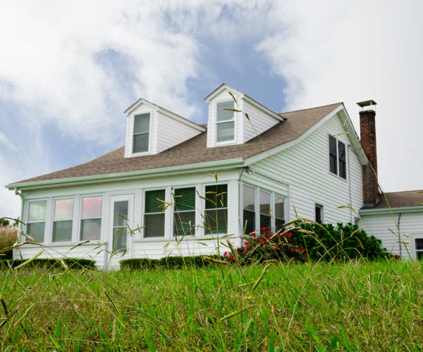 A home and a grassy lawn at Gold Coast in Patuxent River, Maryland