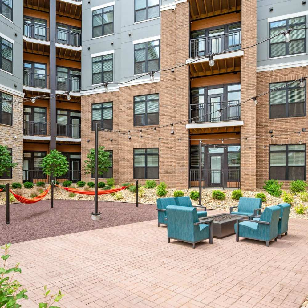 Community view with outdoor lounge seating at Neo Vantage Point in Maryland Heights, Missouri