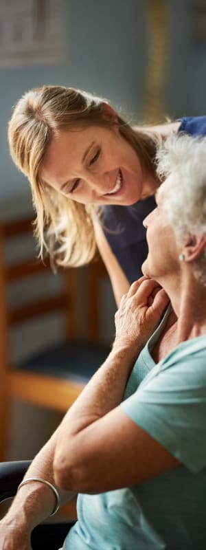 Staff assisting resident at The Residences at Miami, Miami, FL