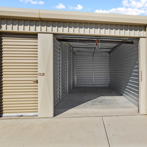 Inside a large outdoor storage unit with drive-up access at StorQuest Self Storage in Lathrop, California