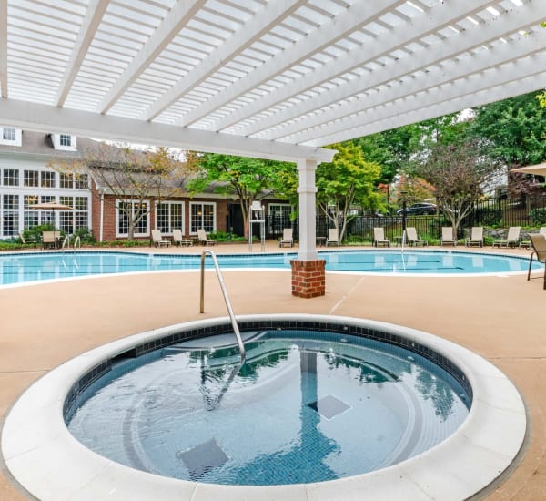 The resort-style swimming pool and spa at Mode at Owings Mills in Owings Mills, Maryland