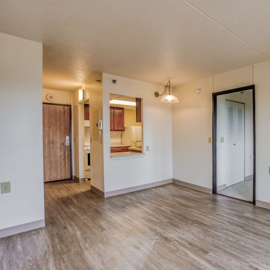 Living room in a unit at Village Center in Detroit, Michigan