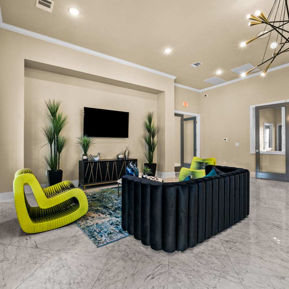 Clubhouse with seating at Cross Timbers Apartments in Greenville, Texas