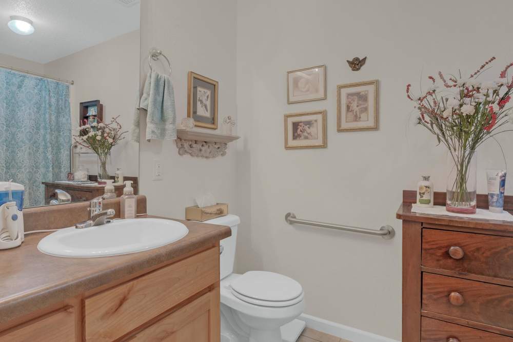 Bathroom with vanity at Hartford Villas in Broken Arrow, Oklahoma