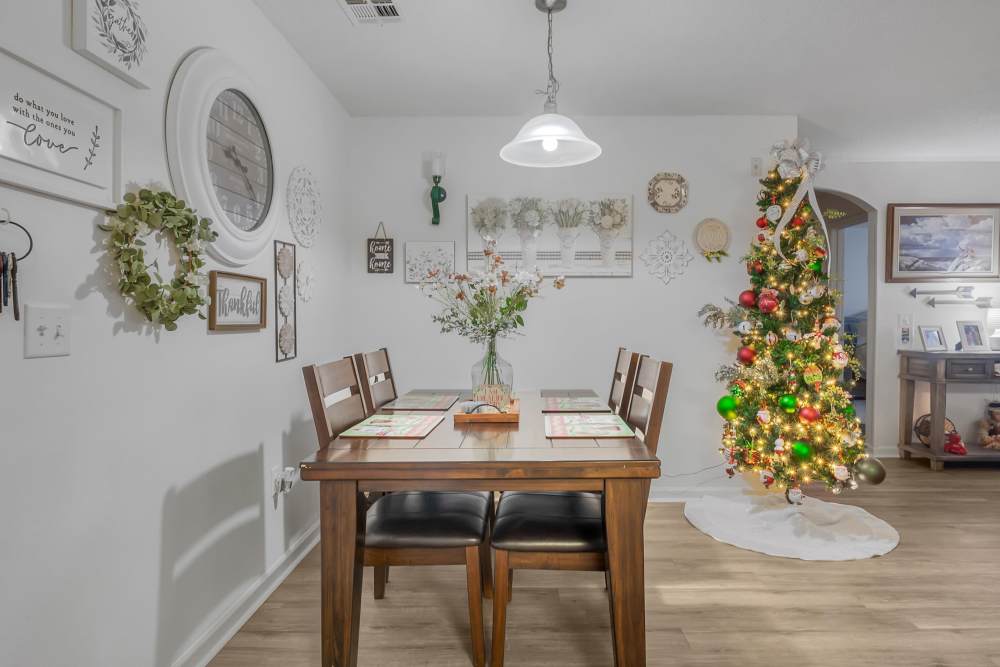 Dining area with hanging light at River Ridge in Sand Springs, Oklahoma