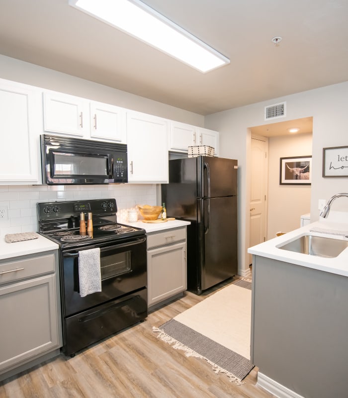 Kitchen with granite countertops at Cross Timber in Oklahoma City, Oklahoma