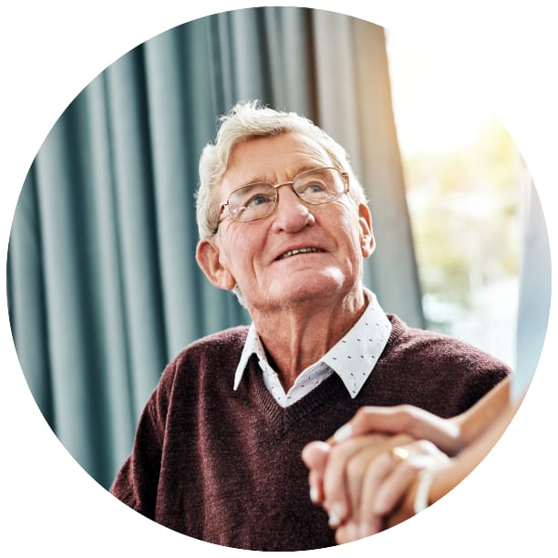 Resident looking up at a Ebenezer Senior Living caretaker