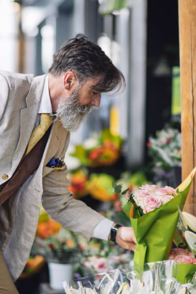 Residents buying flowers near Villa Francisca, West Hollywood, California