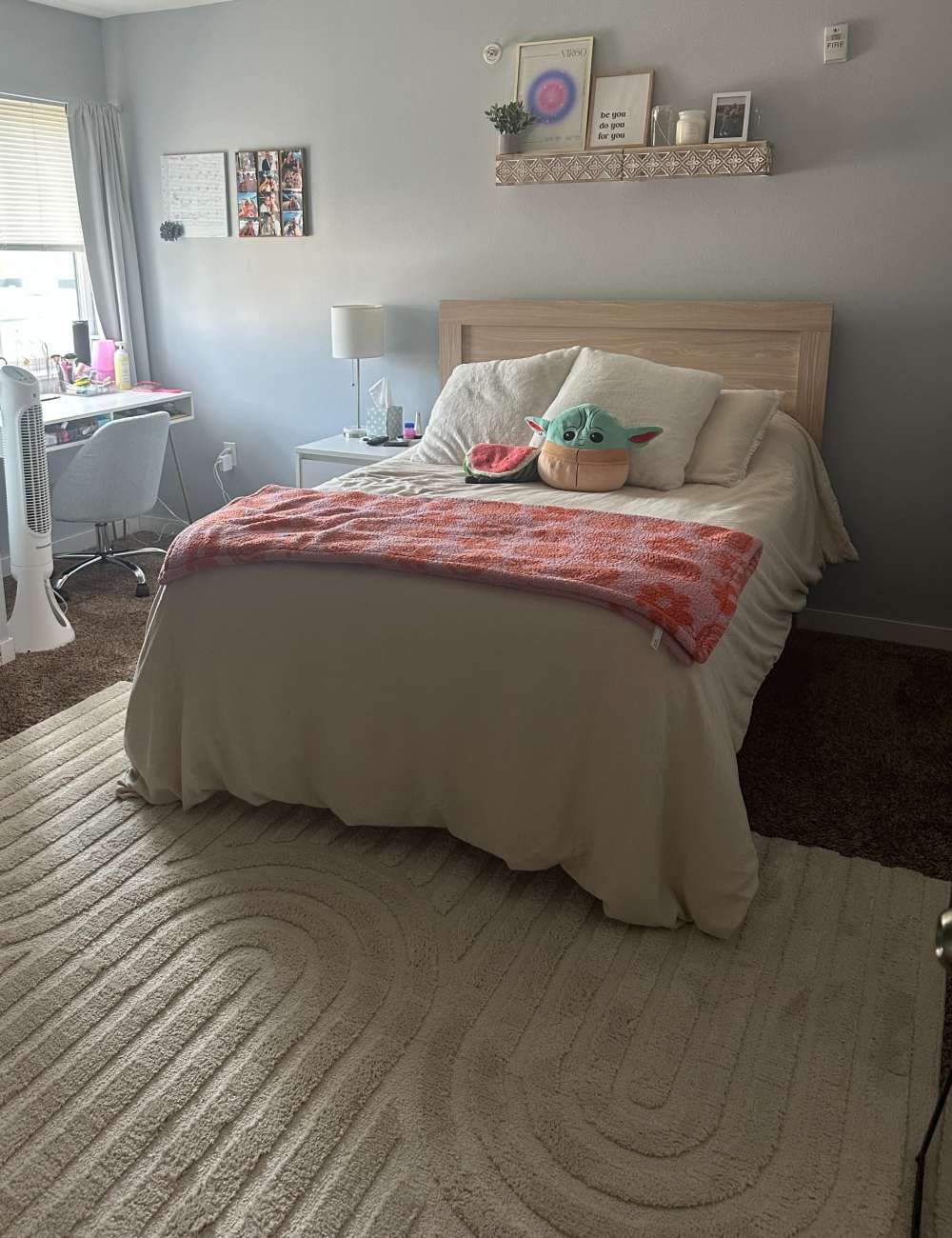 Bedroom with hardwood floors and sunlit window at Lofts @ 1633 in Mankato, Minnesota
